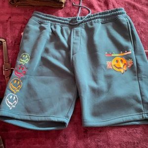 Mixture of green and blue smiley face